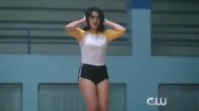 Camila Mendes strutting her stuff in a cheerleader outfit in &quot;Riverdale
